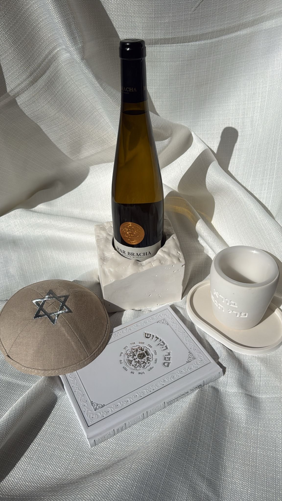 כלי בטון ונרות בעבודת יד מבית Bashan's Designs